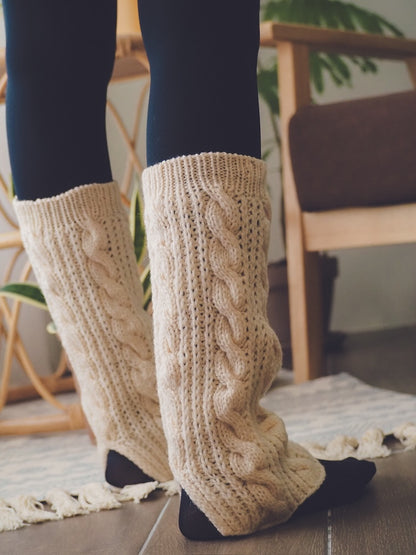 Heidi Leg Warmers | warm cable knit leg warmers made from Woolia by Gepard Garn